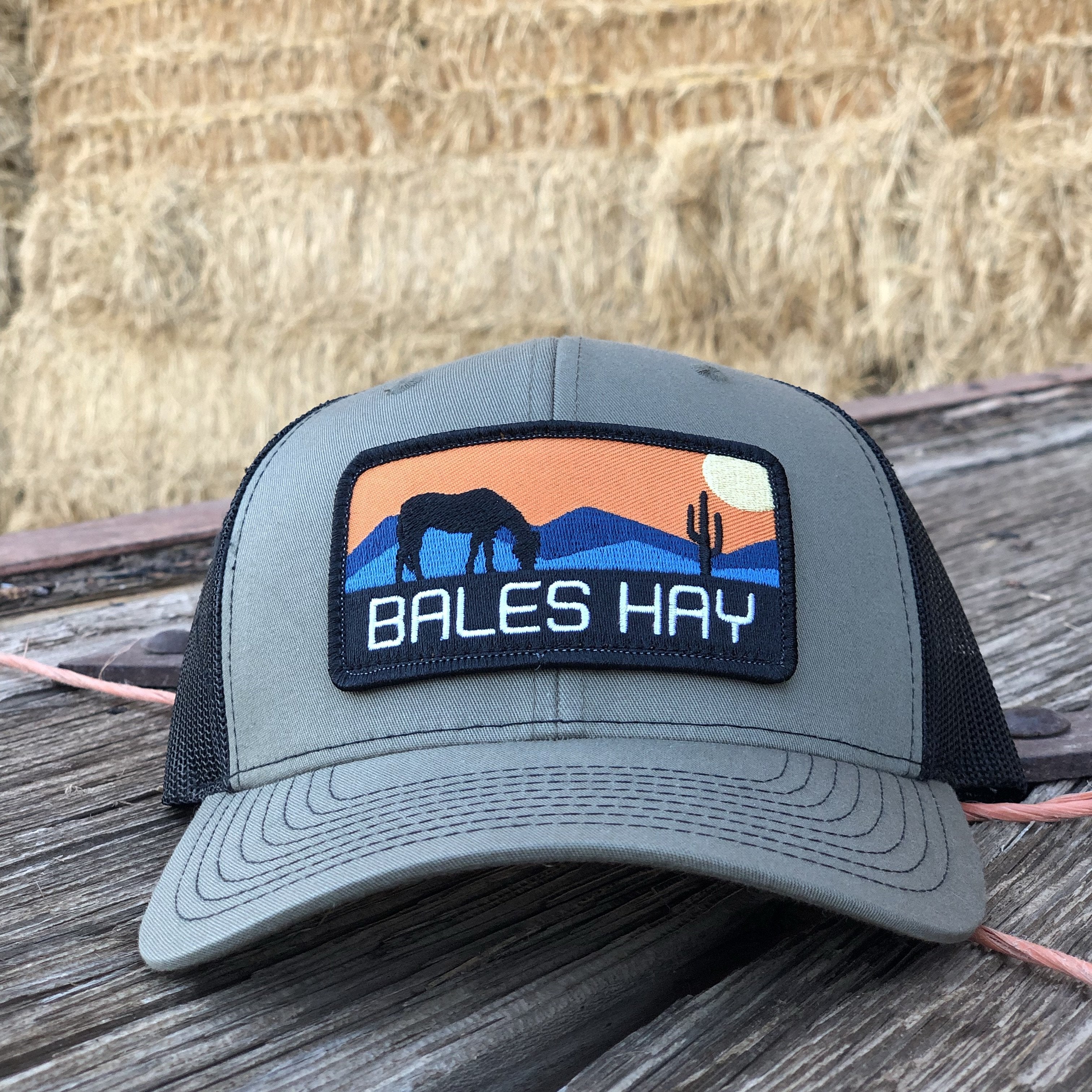This hat is both well-made and comfortable to wear that features the first patch we ever designed! It represents the horses we feed, and the landscape we live in.  
