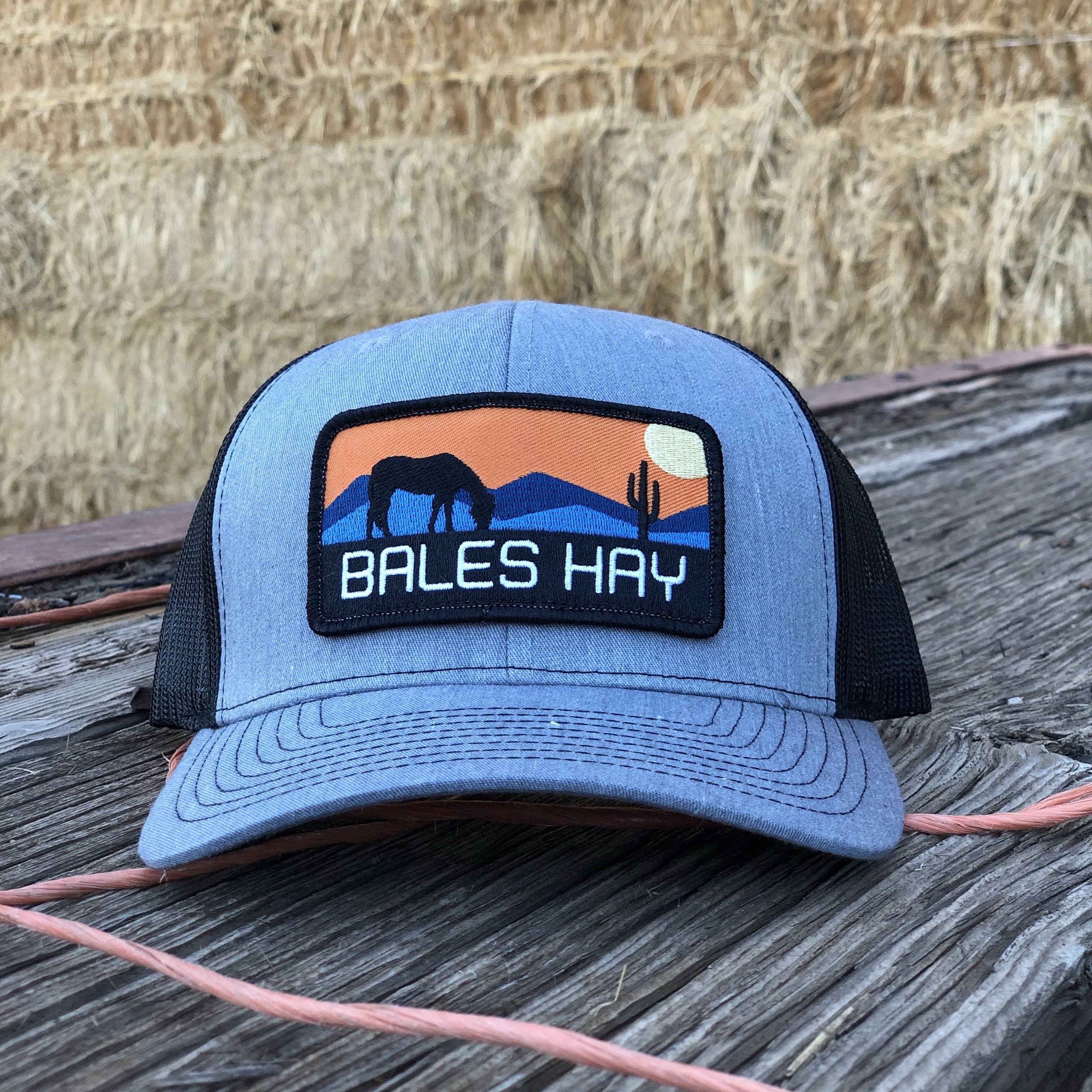 This hat is both well-made and comfortable to wear that features the first patch we ever designed! It represents the horses we feed, and the landscape we live in.  