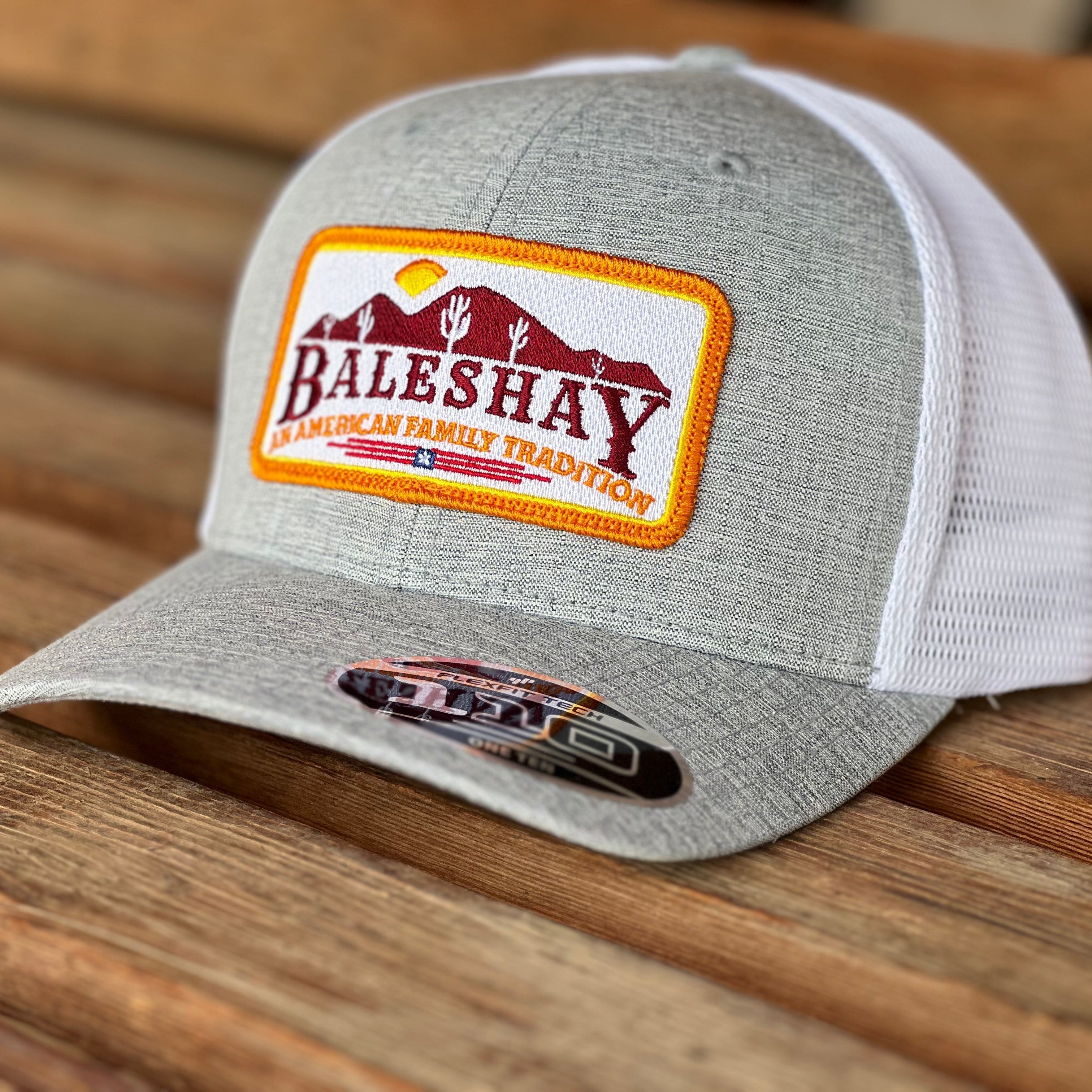 Heather Grey White Mesh Hat featuring our Bales Hay Patch with the mountain scape of Buckeye Arizona!